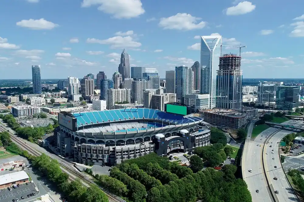 Aerial view of the uptown Charlotte skyline, the football stadium and highways in North Carolina