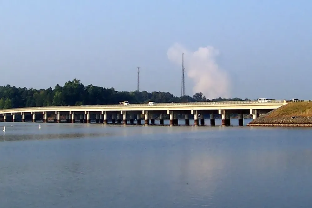The long Buster Boyd Bridge crossing calm water on Lake Wylie, South Carolina
